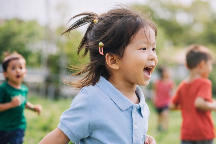 little kids run together